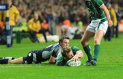 23 February 2008; Ireland's Tommy Bowe goes over for his try despite the tackle of Scotland's Mike Blair. RBS Six Nations Rugby Championship, Ireland v Scotland, Croke Park, Dublin. Picture credit; Matt Browne / SPORTSFILE