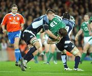 23 February 2008; Ireland's Brian O'Driscoll is tackled by Scotland's Ross Rennie, right, and Ali Hogg. RBS Six Nations Rugby Championship, Ireland v Scotland, Croke Park, Dublin. Picture credit; Brendan Moran / SPORTSFILE