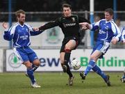 23 February 2008; Kyle Neill, Glentoran, in action against Lee Feeney and Paul Donegan, Newry City. Carnegie Premier league, Newry City v Glentoran, The Showgrounds, Newry, Co. Down. Picture credit; Oliver McVeigh / SPORTSFILE