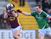 8 March 2015; Ben Brosnan, Wexford, in action against Robert Browne, Limerick. Allianz Football League, Division 3, Round 4, Wexford v Limerick, Wexford Park, Wexford. Picture credit: David Maher / SPORTSFILE