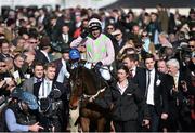 10 March 2015; Ruby Walsh on Douvan is led into the parade ring after winning the Supreme Novices' Hurdle. Cheltenham Racing Festival 2015, Prestbury Park, Cheltenham, England. Picture credit: Ramsey Cardy / SPORTSFILE