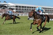 10 March 2015; Un De Sceaux, right, with Ruby Walsh up, leads God's Own, with Paddy Brennan up, who finished second, on their way to winning the Arkle Challenge Trophy, after clearing the last. Cheltenham Racing Festival 2015, Prestbury Park, Cheltenham, England. Picture credit: Ramsey Cardy / SPORTSFILE