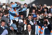 10 March 2015; Ruby Walsh is led into the winner's enclosure after winning the Arkle Challenge Trophy on Un De Sceaux. Cheltenham Racing Festival 2015, Prestbury Park, Cheltenham, England. Picture credit: Ramsey Cardy / SPORTSFILE