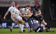 27 February 2015; Gordon D'Arcy, Leinster, is tackled by Sam Davies, 10, and Dan Baker, Ospreys. Guinness PRO12, Round 16, Ospreys v Leinster. Liberty Stadium, Swansea, Wales. Picture credit: Stephen McCarthy / SPORTSFILE