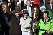 10 March 2015; Jockey Ruby Walsh and trainer Willie Mullins celebrate in the winner's enclosure after victory in the Champion Hurdle with Faugheen. Cheltenham Racing Festival 2015, Prestbury Park, Cheltenham, England. Picture credit: Ramsey Cardy / SPORTSFILE