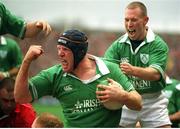 3 February 2002; Ireland's Paul O'Connell celebrates with team-mate Peter Stringer after scoring his try against Wales. Ireland v Wales, Six Nations Championships, Lansdowne Road, Dublin. Picture credit; Brendan Moran / SPORTSFILE