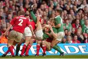 4 February 2007; Andrew Trimble, Ireland, supported by team-mate Ronan O'Gara, right, is tackled by Kevin Morgan, right, Dwayne Peel, centre, and Rhys Thomas, 2, Wales. RBS Six Nations Championship, Wales v Ireland, Millennium Stadium, Cardiff, Wales. Picture credit: Pat Murphy / SPORTSFILE