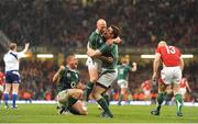 21 March 2009; Ireland players, from left, Jamie Heaslip, Peter Stringer and Brian O'Driscoll celebrate at the final whistle. RBS Six Nations Championship, Wales v Ireland, Millennium Stadium, Cardiff, Wales. Picture credit: Stephen McCarthy / SPORTSFILE
