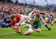 5 February 2012; Tommy Bowe, Ireland, on his way to scoring his side's second try, despite the attention of George North, Wales. RBS Six Nations Rugby Championship, Ireland v Wales, Aviva Stadium, Lansdowne Road, Dublin. Picture credit: Stephen McCarthy / SPORTSFILE