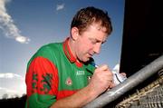24 February 2008; Birr captain Brian Whelahan signs a sliothar at the end of the game. AIB All-Ireland Club Hurling semi-final, Birr v Dunloy, St Tighearnach's Park, Clones, Co. Monaghan. Picture credit; David Maher / SPORTSFILE