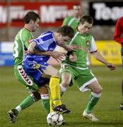 26 February 2008; Jamie Tumelty, Dungannon Swifts in action against Pat Sullivan, left, and Joe Gamble, Cork City. Setanta Cup, Dungannon Swifts v Cork City, Stangmore Park, Dungannon, Co. Tyrone. Picture credit; Oliver McVeigh / SPORTSFILE
