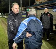 26 February 2008; Cork City manager Alan Mathews, commiserates with Dungannon Swifts manager, Harry Fay at the end of the game. Setanta Cup, Dungannon Swifts v Cork City, Stangmore Park, Dungannon, Co. Tyrone. Picture credit; Oliver McVeigh / SPORTSFILE