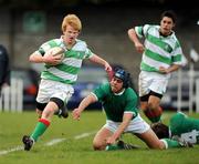 27 February 2008; Sam Stevens, St. Columba's, gets past tackle of Kevin Larchet, Gonzaga. Leinster Schools Vinnie Murray Cup Senior Semi-Final, St. Columba's v Gonzaga. Anglesea Road, Dublin. Picture credit; Caroline Quinn / SPORTSFILE