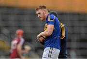 22 February 2015; Denis Maher, Tipperary, leaves the field after picking up an injury. Allianz Hurling League, Division 1A, Round 2, Tipperary v Galway. Semple Stadium, Thurles, Co. Tipperary. Picture credit: Piaras Ó Mídheach / SPORTSFILE