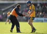 8 March 2015; Clare selector Seoirse Bulfin brings on a spare hurley for Clare's Shane O'Donnell. Allianz Hurling League, Division 1A, Round 3, Clare v Tipperary. Cusack Park, Ennis, Co. Clare. Picture credit: Diarmuid Greene / SPORTSFILE