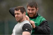 12 March 2015; Ireland's Sean O'Brien puts a GPS unit into Isaac Boss' jersey before squad training. Carton House, Maynooth, Co. Kildare. Picture credit: Brendan Moran / SPORTSFILE