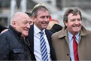 12 March 2015; Former Manchester United and England international footballer Bryan Robson, centre, has his photograph taken with racegoers. Cheltenham Racing Festival 2015, Prestbury Park, Cheltenham, England. Picture credit: Ramsey Cardy / SPORTSFILE