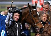 12 March 2015; Jockey Andrew Tinkler celebrates after winning the Pertemps Final Handicap Hurdle on Call The Cops. Cheltenham Racing Festival 2015, Prestbury Park, Cheltenham, England. Picture credit: Ramsey Cardy / SPORTSFILE