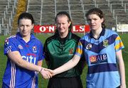 24 February 2008; Referee Una Kearney with Waterford IT captain Ursula Jacob and University College Dublin captain Susie O'Carroll before the start of the game. 2008 Ashbourne Cup Final, University College Dublin v Waterford IT, Casement Park, Belfast, Co. Antrim. Picture credit: Oliver McVeigh / SPORTSFILE