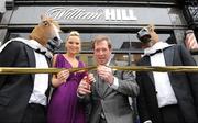 25 February 2008; At the reopening of the newly refurbished William Hill Bookmakers branch on Dame Street, Dublin, are Sarah Morrissey, Miss Ireland 2006, and horse racing personality Derek Thompson. William Hill Bookmakers, Dame Street, Dublin. Picture credit: Pat Murphy / SPORTSFILE