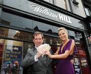 25 February 2008; Horse racing personality Derek Thompson with Miss Ireland 2006 Sarah Morrissey at the reopening of the newly refurbished William Hill Bookmakers branch on Dame Street, Dublin, are . William Hill Bookmakers, Dame Street, Dublin. Picture credit: Pat Murphy / SPORTSFILE