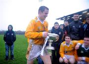 3 February 2008; Antrim captain Sean Delargy makes his way down for the team photo with the cup. Antrim v Offaly, Walsh Cup Final, Casement Park, Belfast, Co. Antrim. Picture credit; Brian Lawless / SPORTSFILE