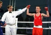 29 February 2008; Referee Teboa ZURAB, from Georgia, raises the arm of Ireland's John Joe Nevin, Cavan Boxing Club, after he defeated Maksym TRETYAK, Ukraine, to qualify for the 54Kg final of the AIBA European Olympic Boxing Qualifing Tournament. The 18 year old from Mullingar also qualifies for the Beijing Olympics. Stadio Olympico, Pescara, Italy. Picture credit: SPORTSFILE