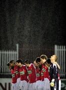29 February 2008; The St Patrick's Athletic team stand for a minutes silence on behalf of the death of two Polish nationals last week. Pre-season Friendly, St Patrick's Athletic v Blackburn Rovers, Richmond Park, Dublin. Picture credit: David Maher / SPORTSFILE