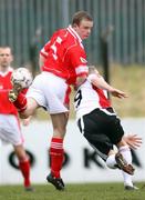 1 March 2008; Barry Holland, Cliftonville, in action against  Gary McCutcheon, Portadown. JJB Sports Irish Cup Quarter-Final, Cliftonville v Portadown, Solitude, Belfast, Co. Antrim. Picture credit: Peter Morrison / SPORTSFILE