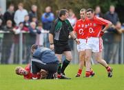 2 March 2008; Cork's Anthony Lynch receives attention during the first half. Allianz National Football League, Division 2, Round 3, Roscommon v Cork, Kiltoom, Roscommon. Picture credit: David Maher / SPORTSFILE