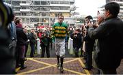 13 March 2015; Jockey Tony McCoy walks into the weigh room after the Grand Annual Chase. Cheltenham Racing Festival 2015, Prestbury Park, Cheltenham, England. Picture credit: Ramsey Cardy / SPORTSFILE