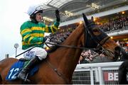 13 March 2015; Jockey Tony McCoy waves to the crowd after the Grand Annual Chase. Cheltenham Racing Festival 2015, Prestbury Park, Cheltenham, England. Picture credit: Ramsey Cardy / SPORTSFILE