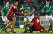 13 March 2015; Conor Oliver, Ireland, is tackled by Harrison Keddie, Wales. U20's Six Nations Rugby Championship, Wales v Ireland, Parc Eirias, Colwyn Bay, Wales. Picture credit: Magi Haroun / SPORTSFILE