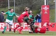 15 March 2015; Paula Fitzpatrick, Ireland, is tackled by Elinor Snowsill and Rachel Taylor, Wales. Women's Six Nations Rugby Championship, Wales v Ireland,St Helen's, Swansea, Wales. Picture credit: Steve Pope / SPORTSFILE