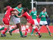 15 March 2015; Sophie Spence, Ireland, is tackled by Sian Williams and Carys Philips, Wales. Women's Six Nations Rugby Championship, Wales v Ireland,St Helen's, Swansea, Wales. Picture credit: Steve Pope / SPORTSFILE