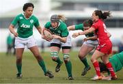 15 March 2015; Ireland's Orla Fitzsimons breaks through the Wales defense. Women's Six Nations Rugby Championship, Wales v Ireland,St Helen's, Swansea, Wales. Picture credit: Steve Pope / SPORTSFILE