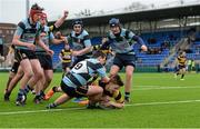 15 March 2015; Daniel Crotty, Carlow, goes over to score his side's 1st try despite the efforts of Mark Farrell, Navan. Youths U17 Premier League Final, Carlow v Navan, Donnybrook Stadium, Donnybrook, Dublin. Photo by Sportsfile