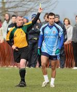 27 February 2008; Referee Eamon McEnaney shows a yellow card to Karl Lacy, UUJ. Ulster Bank Sigerson Cup Senior Football Quarter-Final, QUB v UUJ. The Dub Queen's University, Belfast, Co. Antrim. Picture credit; Oliver McVeigh / SPORTSFILE