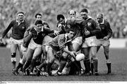 5 March 1988; Ireland scrum-half Michael Bradley gets the ball away watched by team-mates Donal Lenihan, Mike Gibson and Des Fitzgerald. Five Nations Rugby Championship, Ireland v Wales, Lansdowne Road, Dublin. Picture credit: Ray McManus / SPORTSFILE