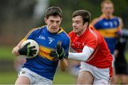 15 March 2015; Colin O'Riordan, Tipperary, in action against Kevin Toner, Louth. Allianz Football League, Division 3, Round 5, Louth v Tipperary, Gaelic Grounds, Drogheda, Co. Louth. Picture credit: Brendan Moran / SPORTSFILE
