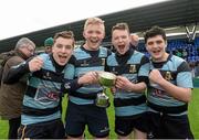 15 March 2015; Navan players, from left, John McLoughlin, Eoin O'Reilly, Eoghan Monaghan, and Fiachra Finnegan, celebrate with the cup after the game. Youths U17 Premier League Final, Carlow v Navan, Donnybrook Stadium, Donnybrook, Dublin. Photo by Sportsfile