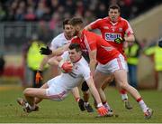 15 March 2015; Padraig McNulty, Tyrone, in action against Eoin Cadogan, Cork. Allianz Football League, Division 1, Round 5, Tyrone v Cork, Healy Park, Omagh, Co. Tyrone. Picture credit: Oliver McVeigh / SPORTSFILE
