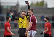 15 March 2015; Ger Egan, Westmeath is black carded by referee John Hickey. Allianz Football League, Division 2, Round 5, Westmeath v Down, Cusack Park, Mullingar, Co. Westmeath. Picture credit: Matt Browne / SPORTSFILE