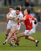 15 March 2015; Sean Cavanagh, Tyrone, in action against Conor Dorman and Mark Collins, Cork. Allianz Football League, Division 1, Round 5, Tyrone v Cork, Healy Park, Omagh, Co. Tyrone. Picture credit: Oliver McVeigh / SPORTSFILE