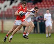 15 March 2015; Fintan Goold, Cork, in action against Padraig McNulty, Tyrone. Allianz Football League, Division 1, Round 5, Tyrone v Cork, Healy Park, Omagh, Co. Tyrone. Picture credit: Oliver McVeigh / SPORTSFILE