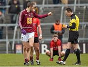 15 March 2015; Kevin Maguire, Westmeath, leaves the pitch after being sent off by referee John Hickey. Allianz Football League, Division 2, Round 5, Westmeath v Down, Cusack Park, Mullingar, Co. Westmeath. Picture credit: Matt Browne / SPORTSFILE