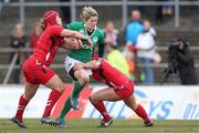 15 March 2015; Allison Miller, Ireland, is tackled by Carys Phillips and Gemma Rowland, Wales. Women's Six Nations Rugby Championship, Wales v Ireland,St Helen's, Swansea, Wales. Picture credit: Steve Pope / SPORTSFILE