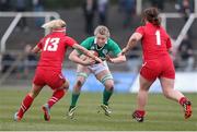 15 March 2015; Claire Molloy, Ireland, is tackled by Adi Taviner and Jenny Davies, Wales. Women's Six Nations Rugby Championship, Wales v Ireland,St Helen's, Swansea, Wales. Picture credit: Steve Pope / SPORTSFILE