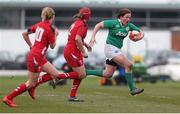 15 March 2015; Ailis Egan, Ireland, charges through the Wales defence. Women's Six Nations Rugby Championship, Wales v Ireland,St Helen's, Swansea, Wales. Picture credit: Steve Pope / SPORTSFILE