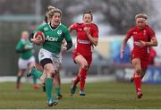 15 March 2015; Alison Miller, Ireland, breaks through the Wales defence to score a try. Women's Six Nations Rugby Championship, Wales v Ireland,St Helen's, Swansea, Wales. Picture credit: Steve Pope / SPORTSFILE